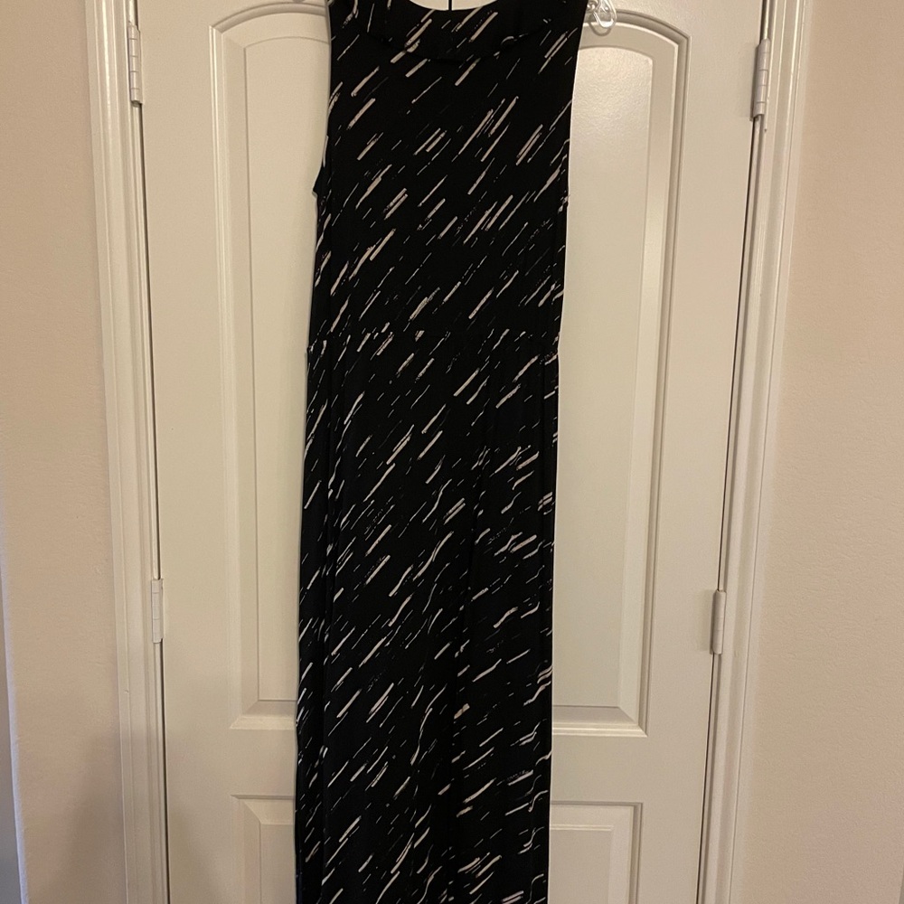 Black with tan accents maxi dress.  Never worn.
